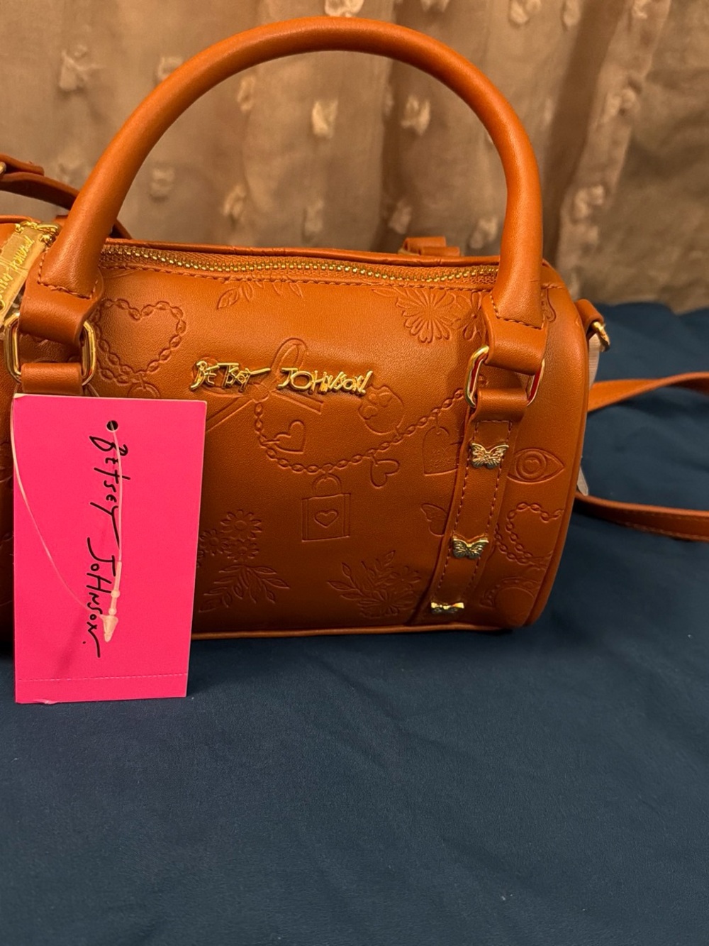 Betsey Johnson Orange Embossed Barrel Crossbody Bag
